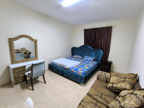 Rooms opposite mega mall in telephone shops roundabout flat no 203